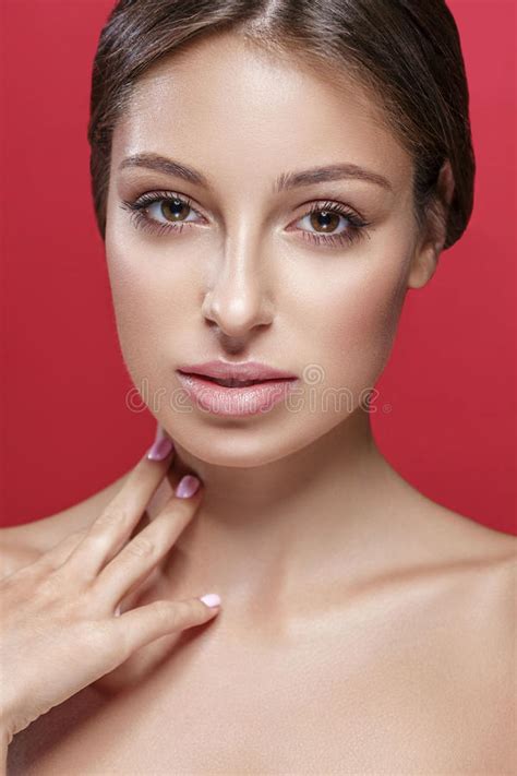 Beautiful Woman Touching Her Neck By Fingers Close Up Studio Portrait