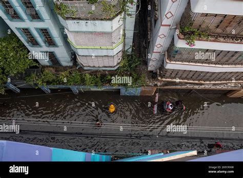 Dhaka Bangladesh Th Oct People Wade Through A Waterlogged