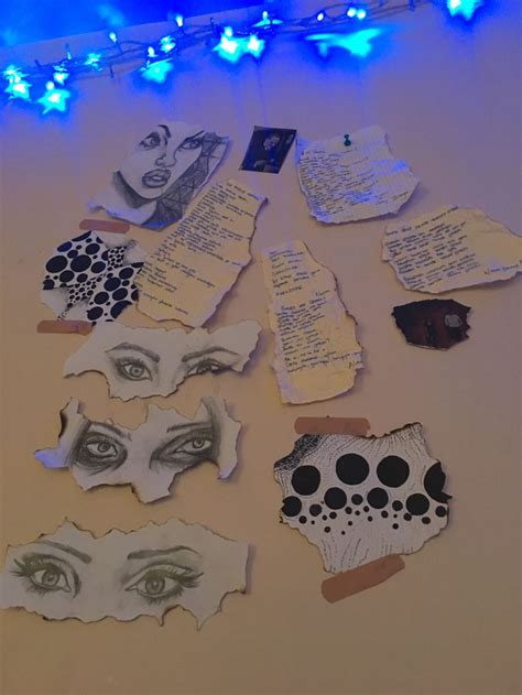 Several Pieces Of Torn Paper With Eyes And Words Attached To Them On A