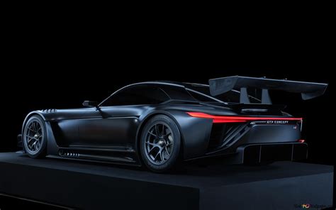 Toyota GR GT3 Concept futurist car backside view with dark background ...