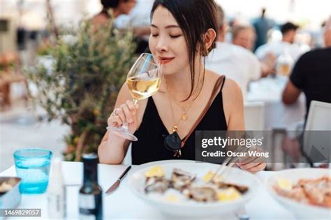 9,455 Asian Woman Drinking Wine Stock Photos, High-Res Pictures, and ...