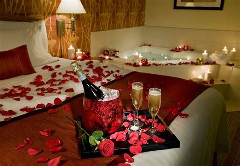 Bed Romantic Room Decoration With Candles And Roses