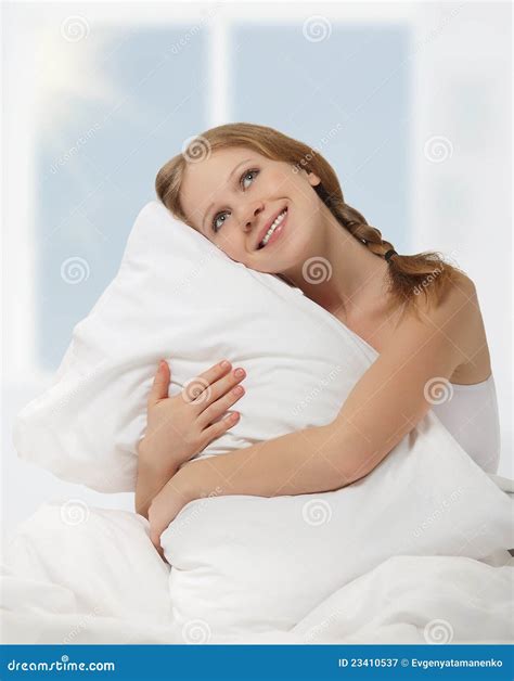 Woman Hugging Her Pillow