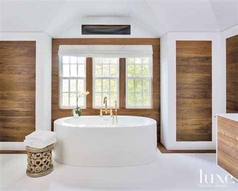 Neutral Modern Master Bathroom with Wood Paneling - Luxe Interiors + Design