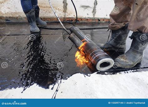 Worker Covered Surface Bitumen Primer For Improving Adhesion During