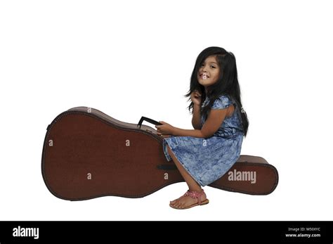 Girl With Guitar Case Stock Photo Alamy