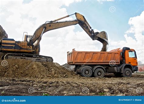 Excavator Loading Truck Stock Image Image Of Construction 67945417