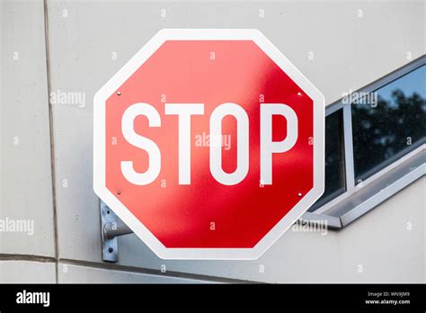 German Stop Sign On A Concrete Wall Stock Photo Alamy