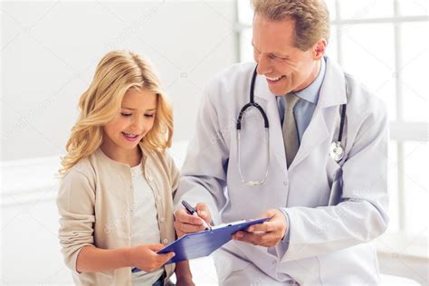 Little Girl And Pediatrician — Stock Photo © Georgerudy 108508892