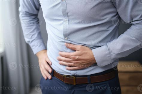 Adult person stomach ache holding hand on belly pain diarrhea