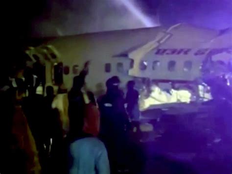 Pictures Dubai Kerala Air India Express Flight Crashes Splits Into