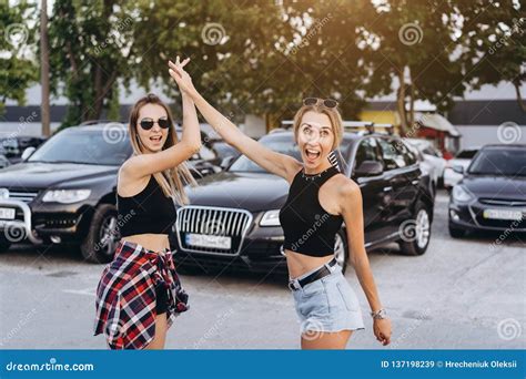 Two Girls Met In The Car Parking Stock Image Image Of Cheerful Morning 137198239