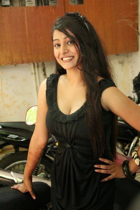 Hot Indian Dj Actress Debjani Exposing Deep Cleavage In Low Cut Black