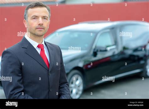 limousine and hearse driver Stock Photo - Alamy