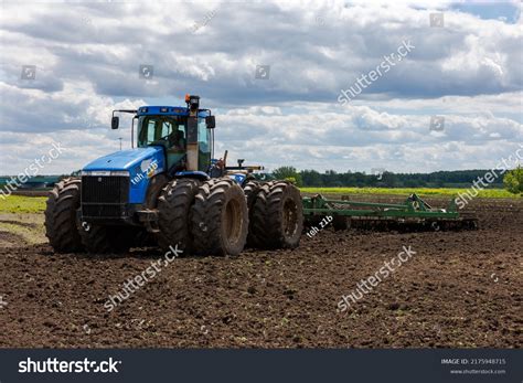 Blue New Holland Tractor Double Wheels Stock Photo