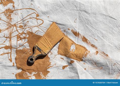 drop cloth    paint brush stock photo image  remodel