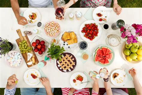 Group of Young People Eating Stock Photo - Image of outdoor, friends ...