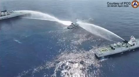 China Coast Guard Fires Water Cannons At Ph Vessels Near Scarborough