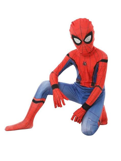 A Spider Man Sitting On The Ground With His Legs Crossed And Eyes Wide