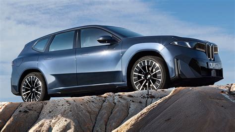 bmw ix ev revealed lands  canada