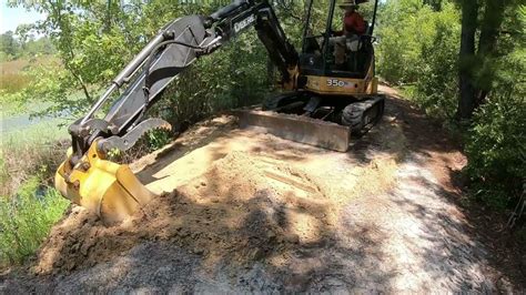 Big Dam Hole Fixing A Massive Muskrat Hole On A Pond Dam Youtube