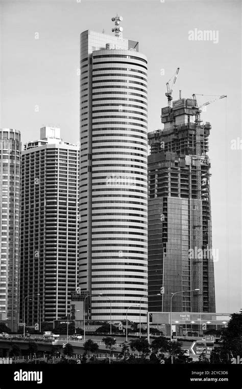 Vertical black and white architecture of AXA Tower, Singapore Stock Photo - Alamy