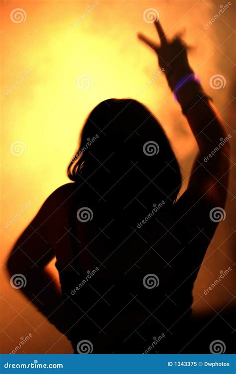 Silhouette Of A Dancing Woman Pointing In Night Sky Woman Silhouette