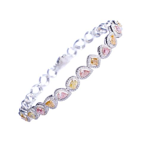 Fancy Colored Diamond Bracelet in 18 Karat White Gold at 1stDibs