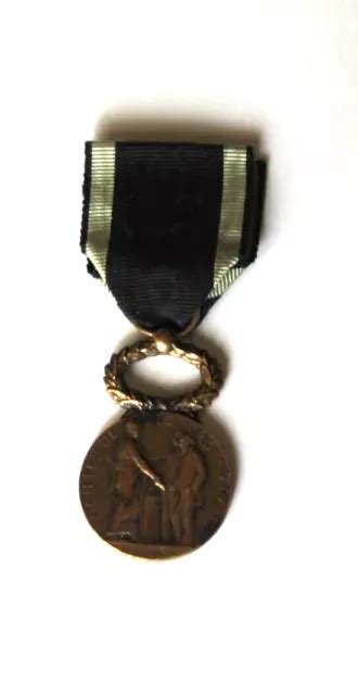 MÉDAILLE D HONNEUR SOCIÉTÉS de secours Mutuels en bronze signé O ROTY