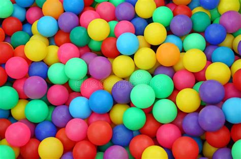 Many Colorful Plastic Balls in a Kids` Ball Pit at a Playground Stock ...