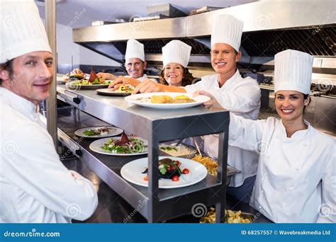 Portrait Of Chef Team Smiling Stock Image Image Of Camera Cookery