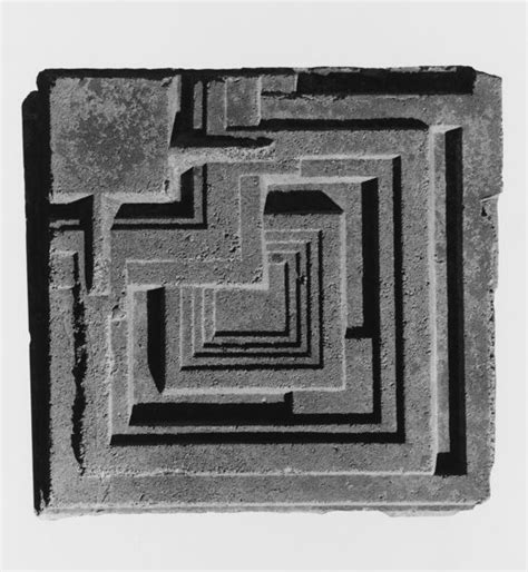 A Black And White Photo Of A Maze In The Middle Of Concrete With Lines