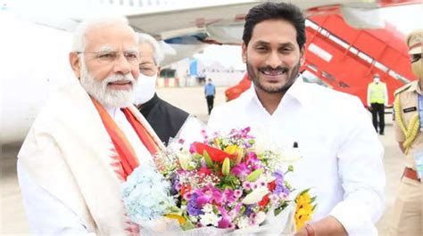 Modi Jagan Bonhomie Photos Of Leaders Walking Together Talking