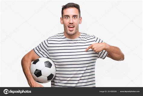 Handsome Young Man Holding Soccer Football Surprise Face Pointing ...