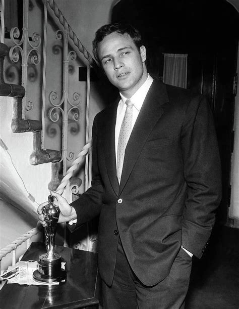 Marlon Brando With His Oscar Photograph by Globe Photos - Pixels