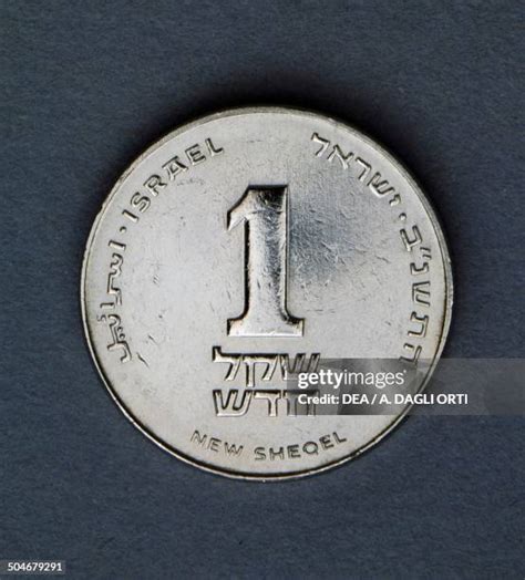 Shekel Symbol Photos and Premium High Res Pictures - Getty Images