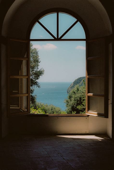 ocean view   open window window view photography window view
