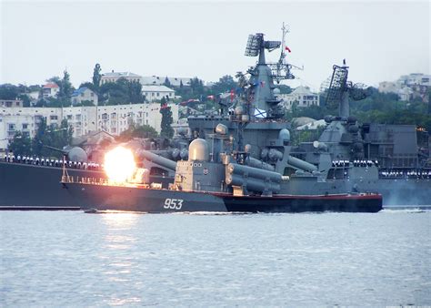 tarantul class corvette fires  gun  front  slava class cruiser