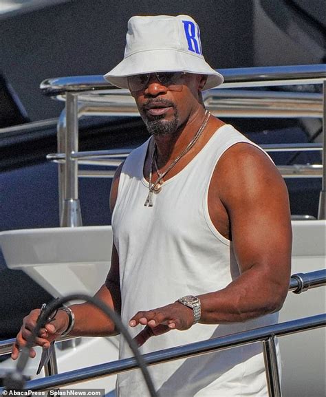 Jamie Foxx 54 Shows Off His Impressive Biceps As He Enjoys A Luxury