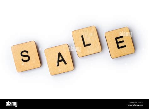 The Word SALE Spelt With Wooden Letter Tiles Stock Photo Alamy