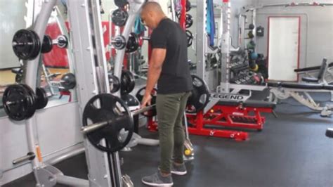 How To Do The Smith Machine Deadlift For Strength Skill And Muscle Barbend