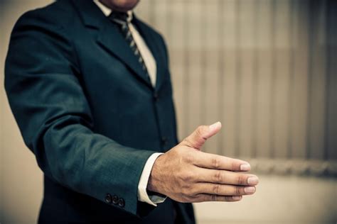 premium photo asian businessman   hand   shake