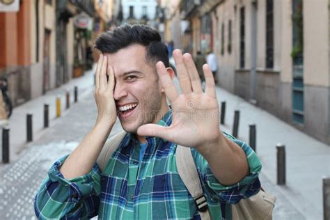 Embarrassed Cute Guy Smiling At Camera Stock Photo Image Of Laughter