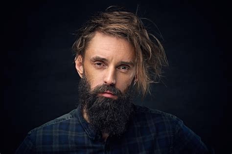 Free Photo Close Up Portrait Of Bearded Male With Long Hair Over Dark