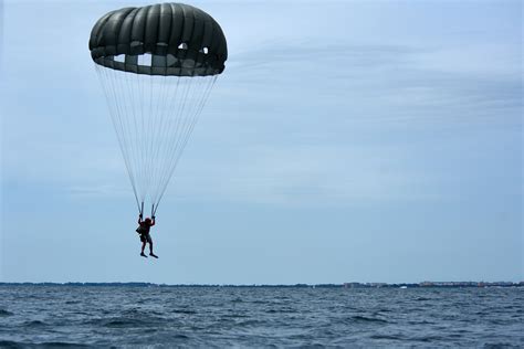 Usaf Pararescueman Assigned To The 57th Rescue Squadron Parachutes Into