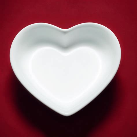 Ai Generated A White Heart Shaped Plate Sits Empty On A Surface Ai