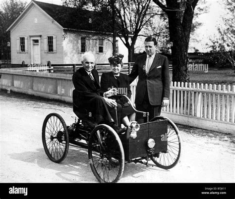 Henry Ford In His First Automobile Dated 1896 With Him Wife Clara