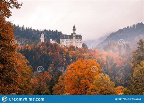 Mesmerizing View Of The Neuschwanstein Castle On A Hill With Autumn