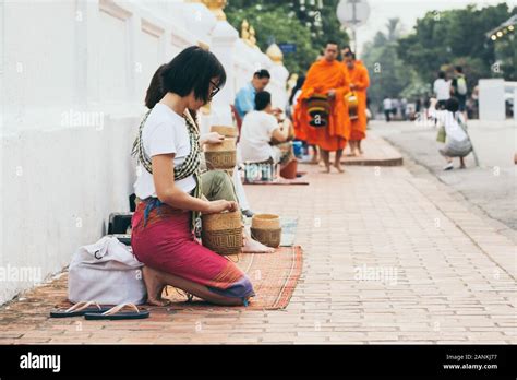 Luang Prabang Laos May Laotian Woman Making Offerings To