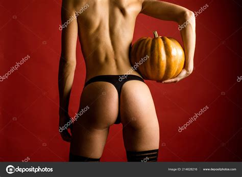 Sexy Vampire Woman Buttocks Female With Sexy Ass Posing On Pumpkin